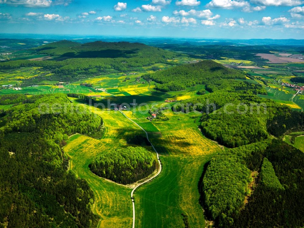 Aerial photograph Bermbach - Forest and mountain landscape of the mid-mountain range Thueringische Rhoen in Bermbach in the state Thuringia, Germany