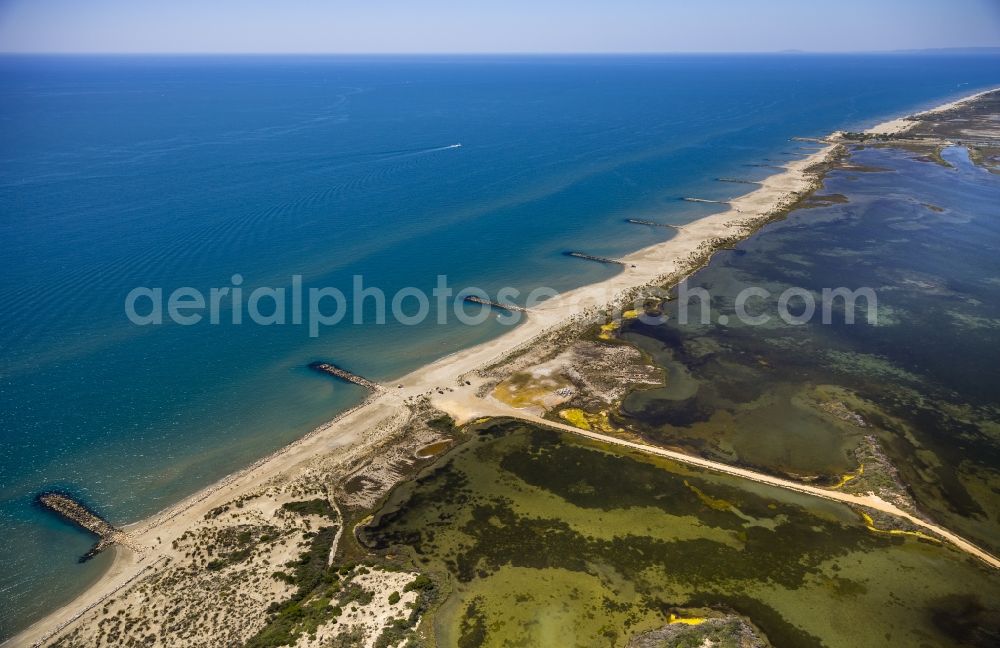 Saintes-Maries-de-la-Mer from the bird's eye view: Mediterranean coast landscape in Saintes-Maries-de-la-Mer, Provence-Alpes-Cote d'Azur in France