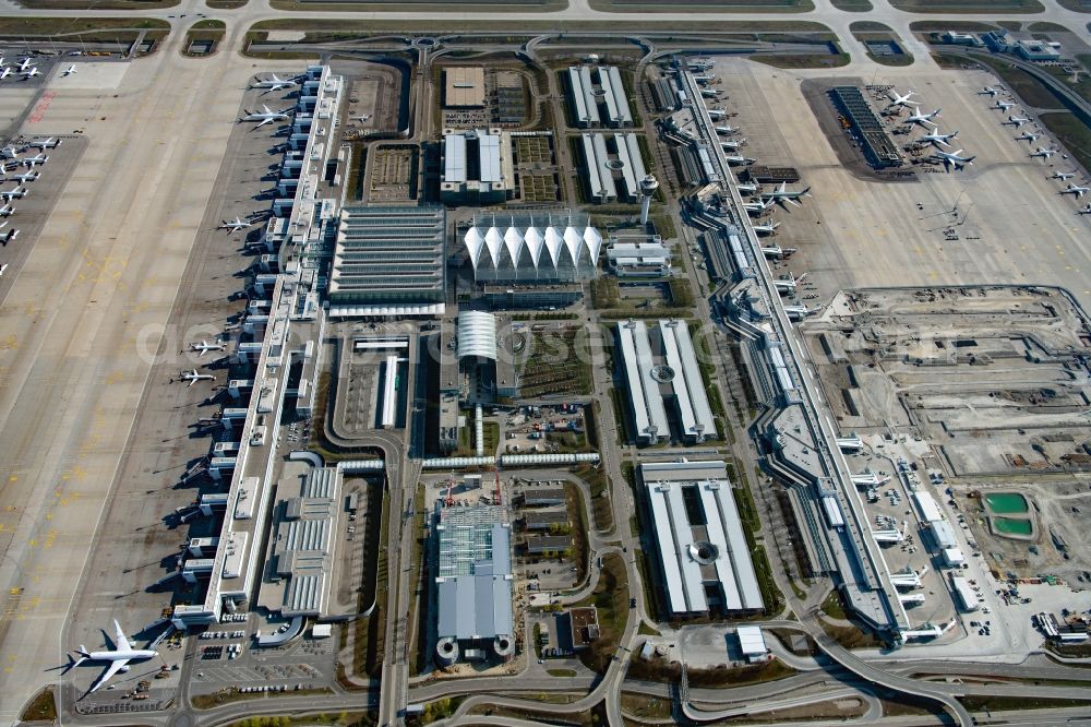 Oberding from above - White membrane roof construction on the central terminal building Muenchen Airport Centers (MAC) and terminal on the grounds of Munich Airport in Oberding in the state Bavaria, Germany