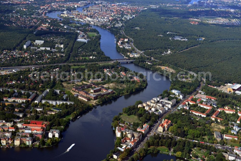 Aerial photograph Berlin - The river Dahme enters the mouth of the river Spree in the Köpenick district of Berlin. View overlooking the Wuhlheide and Oberschöneweide. Visible are the ruins of the former industrial cleaning factory Rewatex which is in the planning area of the residential Wasserstadt Spindlersfeld