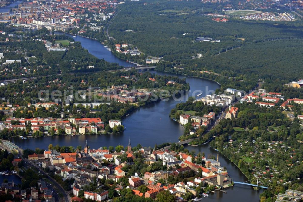 Berlin from above - The river Dahme enters the mouth of the river Spree in the Köpenick district of Berlin. View overlooking the Wuhlheide and Oberschöneweide. Visible are the ruins of the former industrial cleaning factory Rewatex which is in the planning area of the residential Wasserstadt Spindlersfeld