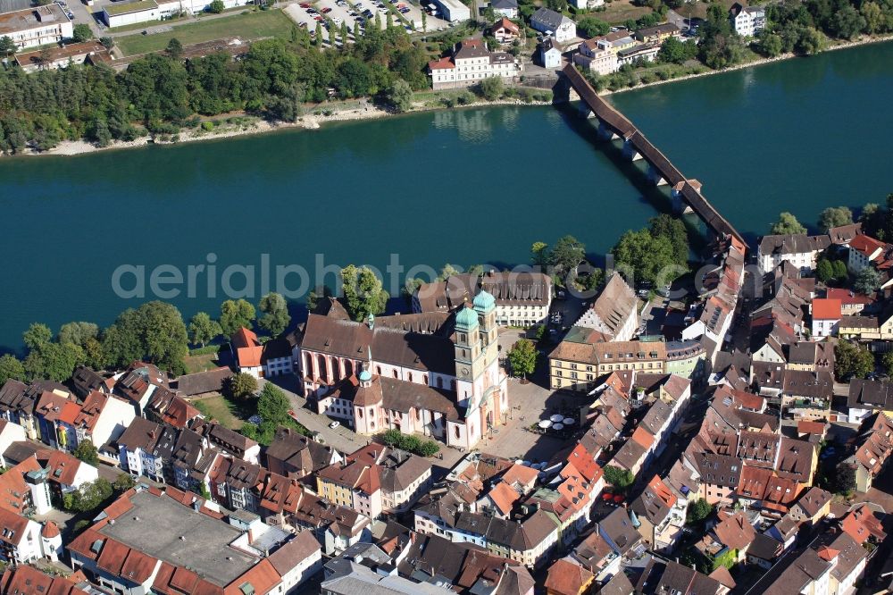 Bad Säckingen from the bird's eye view: Church building Muenster St. Fridolin in the Old Town- center of Bad Saeckingen in the state Baden-Wuerttemberg. The historic wooden bridge over the Rhine links Germany with Switzerland