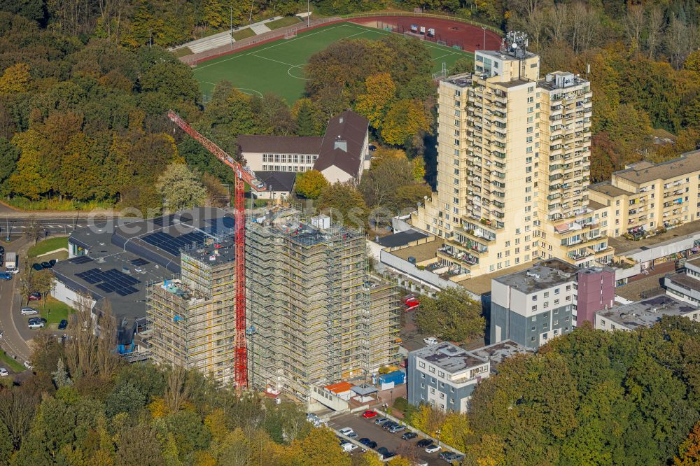 Bochum from the bird's eye view: Construction site for the renovation and modernization of a student dormitory building Querenburger Hoehe on street Bellenkamp in the district Querenburg in Bochum at Ruhrgebiet in the state North Rhine-Westphalia, Germany