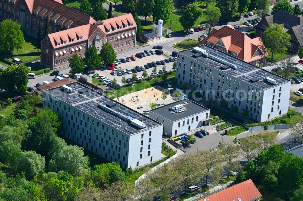 Aerial photograph Berlin - MUF Modular accommodation for refugees as refugee home and asylum accommodation building on street Lindenberger Weg in the district Buch in Berlin, Germany