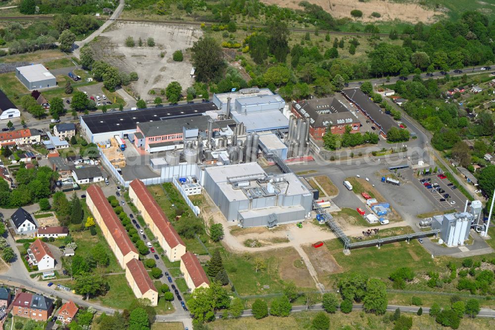 Hansestadt Wismar from above - Elevated tanks and technical systems on the buildings on the dairy factory premises on street Molkereistrasse in Hansestadt Wismar in the state Mecklenburg - Western Pomerania, Germany