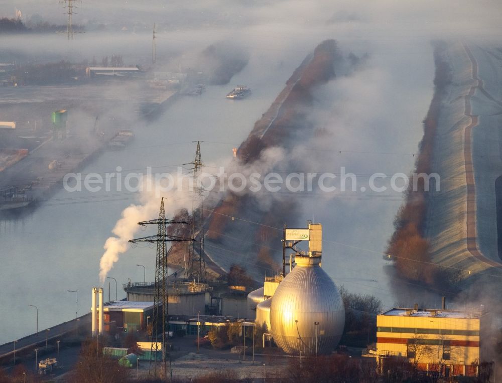 Hamm from the bird's eye view: Morning mist over the water treatment plant with digester on dates-Hamm Canal and lip at sunrise in Hamm, North Rhine-Westphalia