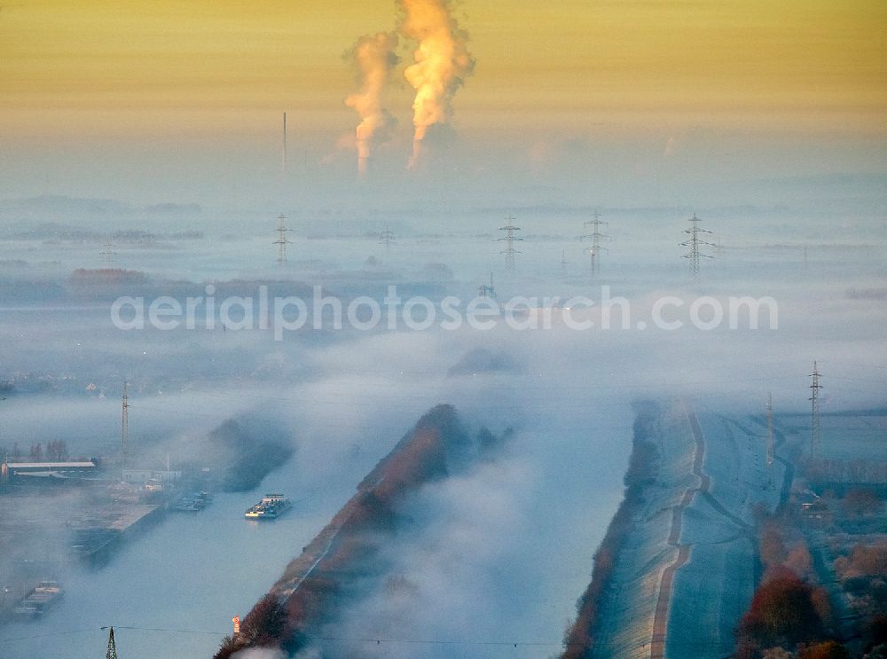 Aerial image Hamm - Morning mist over the water treatment plant with digester on dates-Hamm Canal and lip at sunrise in Hamm, North Rhine-Westphalia