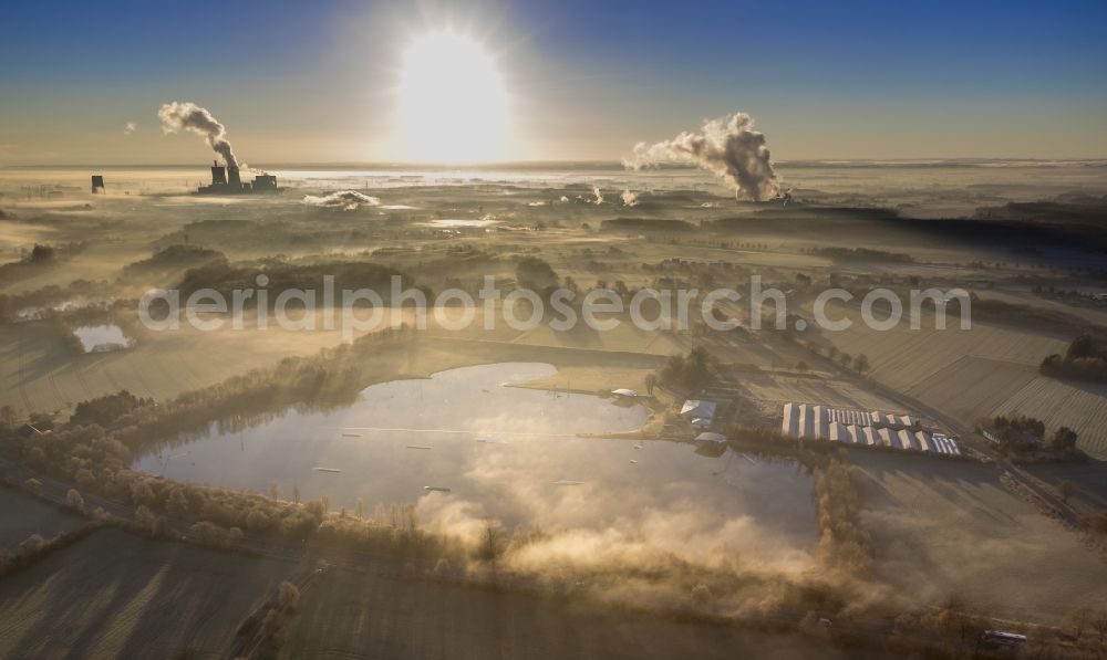 Hamm from above - Morning mist over the lip and the meadows of the Lippeauen at sunrise on a former nuclear power plant, today THTR - RWE coal power plant of RWE in Hamm in North Rhine-Westphalia