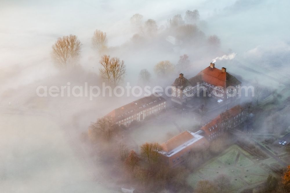 Aerial photograph Hamm - Morning mist over the lip and the meadows of the Lippeauen at sunrise on Oberwerries Castle in Hamm in North Rhine-Westphalia