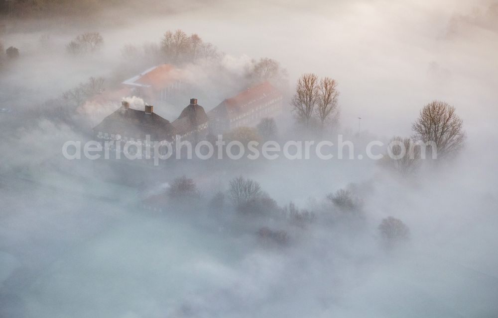 Hamm from above - Morning mist over the lip and the meadows of the Lippeauen at sunrise on Oberwerries Castle in Hamm in North Rhine-Westphalia