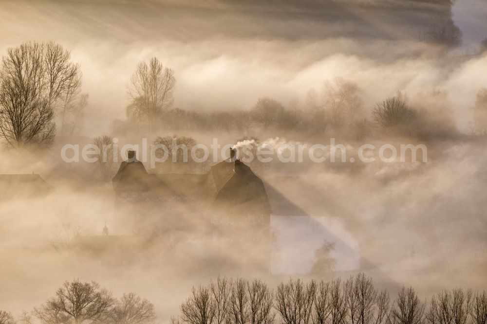 Aerial photograph Hamm - Morning mist over the lip and the meadows of the Lippeauen at sunrise on Oberwerries Castle in Hamm in North Rhine-Westphalia