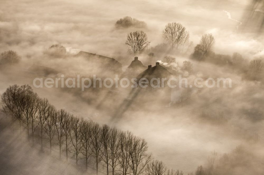 Hamm from above - Morning mist over the lip and the meadows of the Lippeauen at sunrise on Oberwerries Castle in Hamm in North Rhine-Westphalia