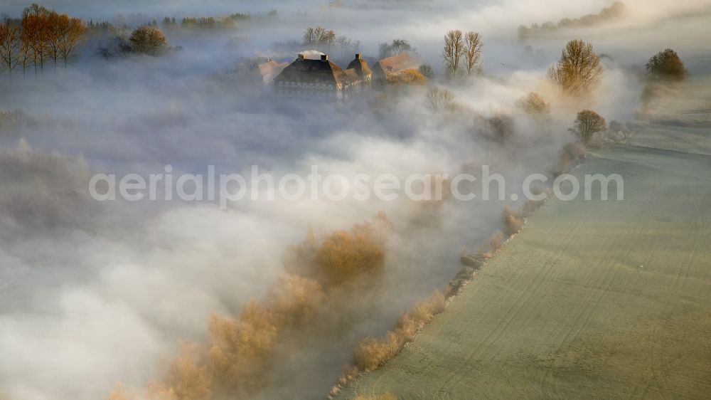 Hamm from above - Morning mist over the lip and the meadows of the Lippeauen at sunrise on Oberwerries Castle in Hamm in North Rhine-Westphalia