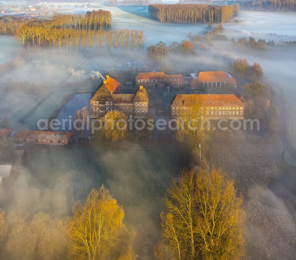 Hamm from above - Morning mist over the lip and the meadows of the Lippeauen at sunrise on Oberwerries Castle in Hamm in North Rhine-Westphalia