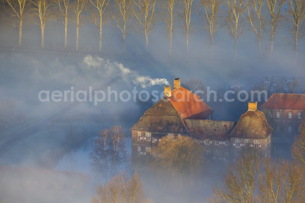 Hamm from above - Morning mist over the lip and the meadows of the Lippeauen at sunrise on Oberwerries Castle in Hamm in North Rhine-Westphalia