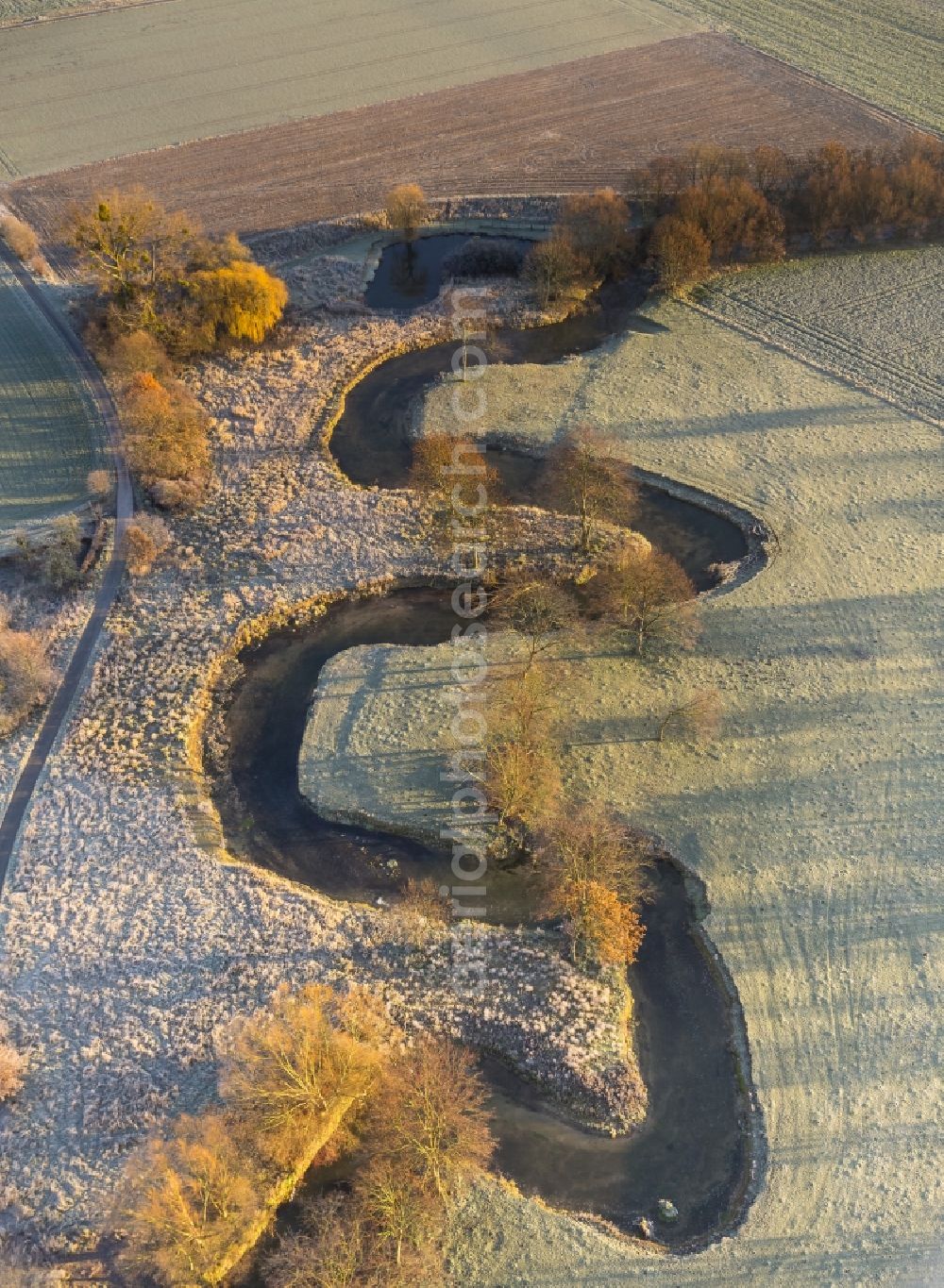 Aerial photograph Hamm - Morning fog over the course of the river Ahse to the restoration sites and the meadows of the Lippeauen at sunrise in Hamm in North Rhine-Westphalia