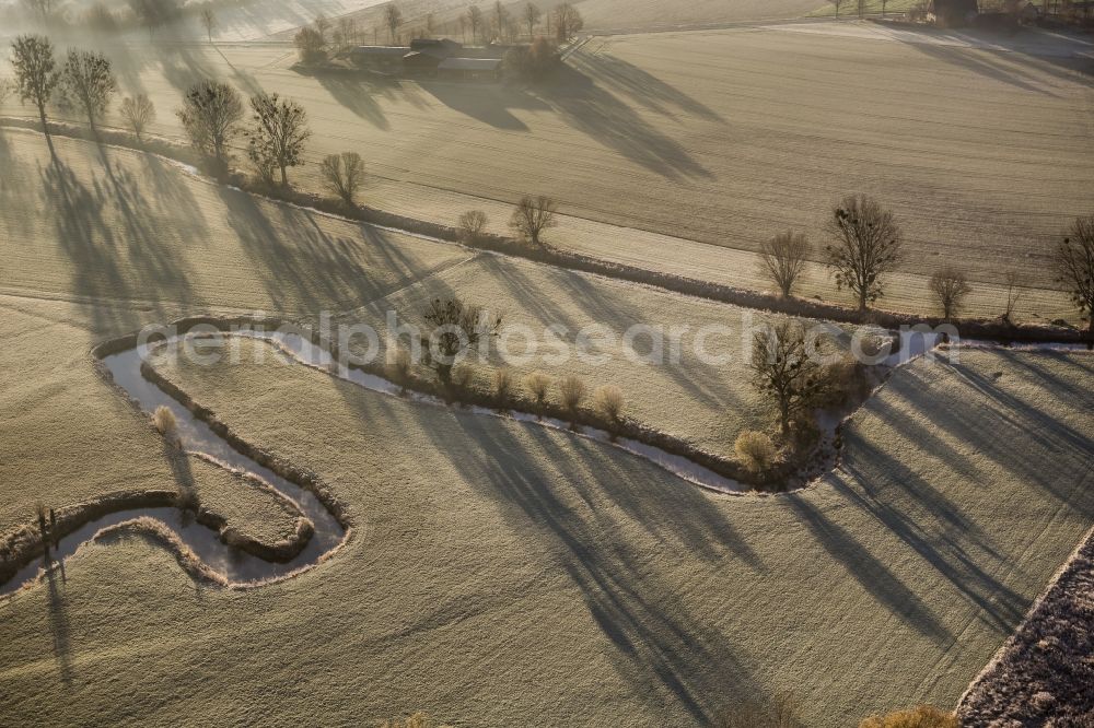 Hamm from the bird's eye view: Morning fog over the course of the river Ahse to the restoration sites and the meadows of the Lippeauen at sunrise in Hamm in North Rhine-Westphalia