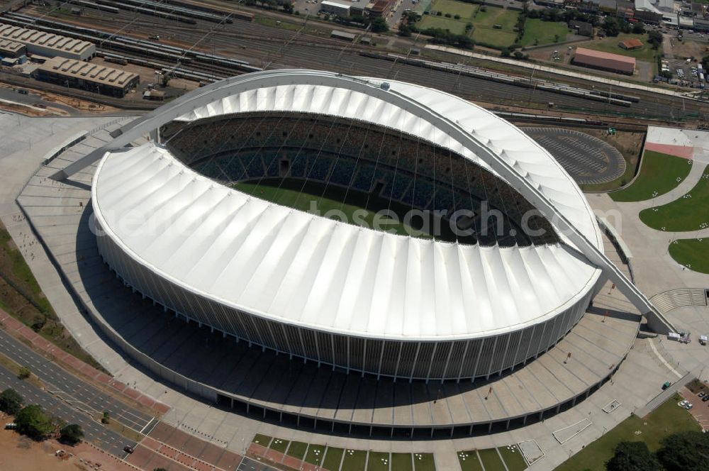 Aerial photograph Durban - Blick auf das Moses-Mabhida-Stadion (Baubeginn unter dem Namen: King-Senzangakhona-Stadion) in Durban in der Provinz KwaZulu-Natal in Südafrika, erbaut zur Fußball-Weltmeisterschaft. Die Stadt Durban (Ethekwini Municipality) ist in diesem Projekt Bauherr und wird durch die afrikanische Baufirma BKS Group vertreten. Die Firma Pfeifer Seil- & Hebetechnik (Memmingen) ist als Generalunternehmer für die gesamte Dachkons??????????????????????????????????????????????????†????????????????????????????????????????????????????????????????????????????????????????????????????????