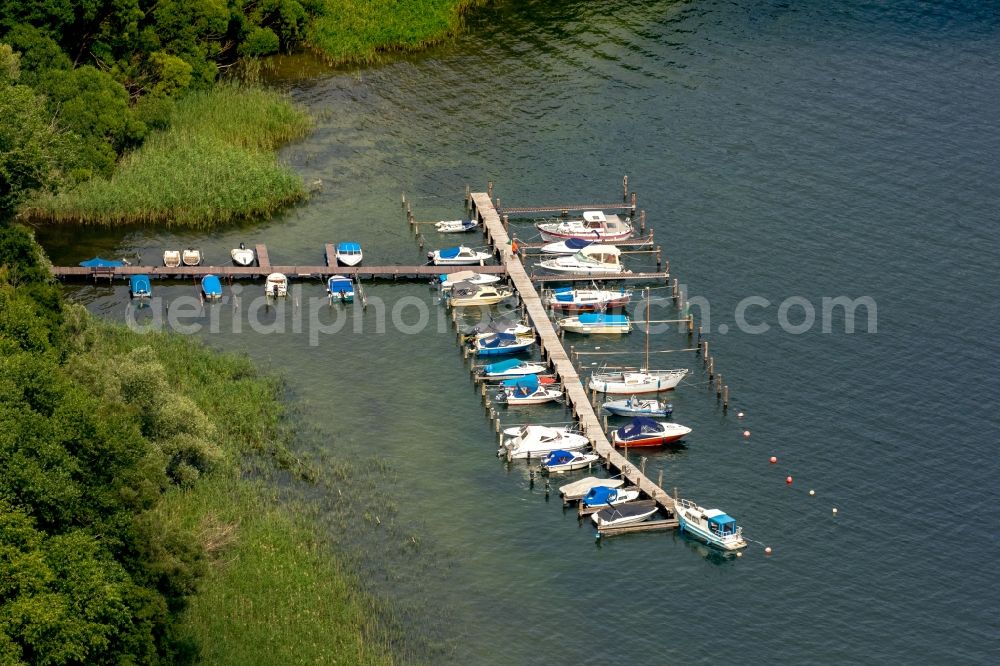 Plau am See from the bird's eye view: Motorboat marina with docks on the shore area of Plauer See in Plau am See in the state Mecklenburg - Western Pomerania