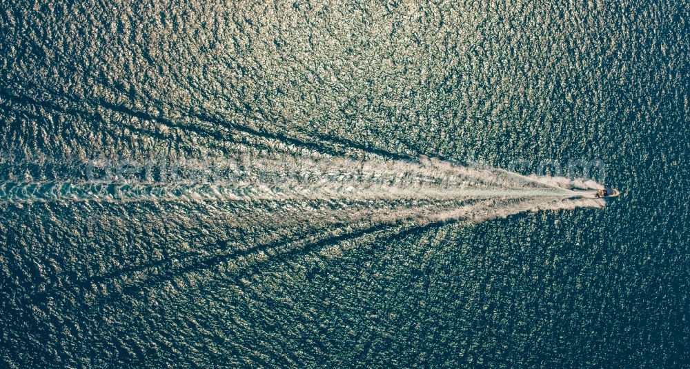 Aerial photograph Alcudia - Motorboat - speedboat in motion in the bay of Alcudia in Alcudia in Balearic island of Mallorca, Spain