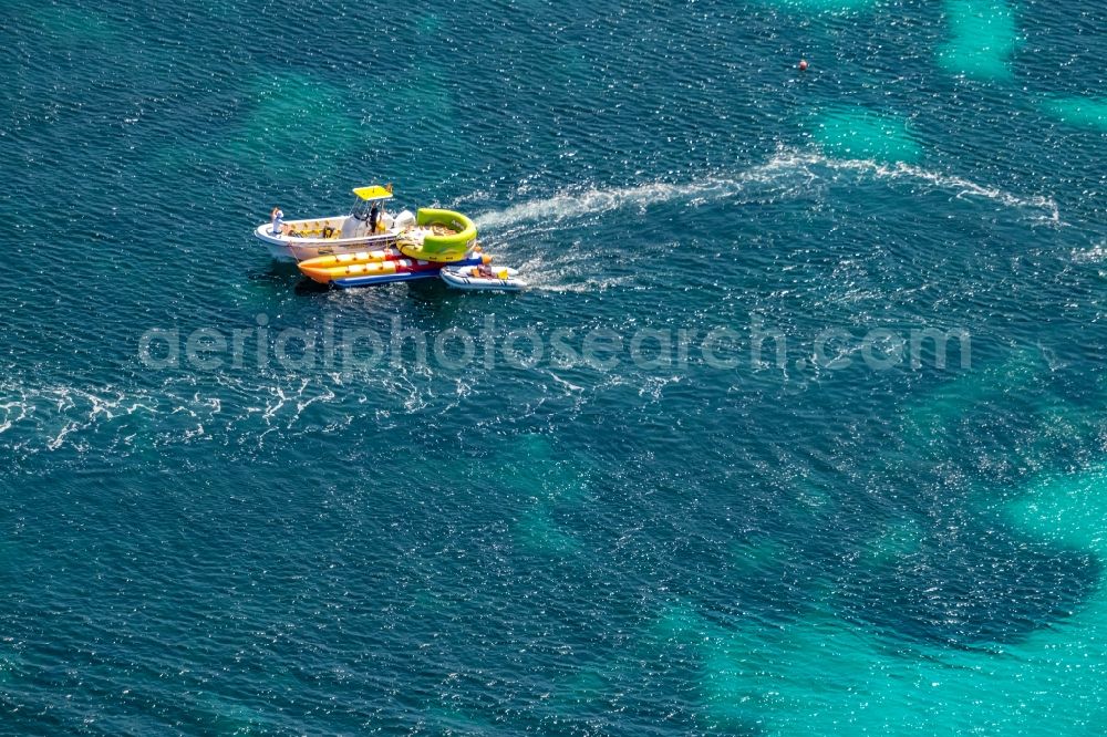Aerial photograph Palma - Motorboat - speedboat in motion with mobile rental for various pedal boats and inflatable air islands in Palma in Balearic island of Mallorca, Spain