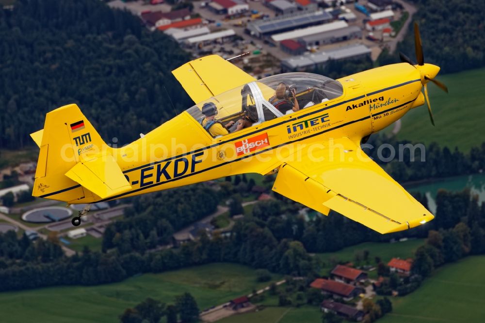 Geretsried from the bird's eye view: Aircraft Mue 30 Schlacro in flight over the airspace in Eurasburg in the state Bavaria, Germany