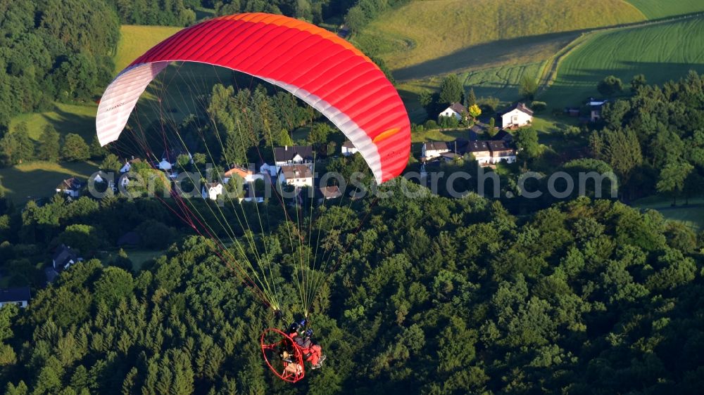 Königswinter from above - Motorized paraglider in flight over the airspace in Koenigswinter in the state North Rhine-Westphalia, Germany