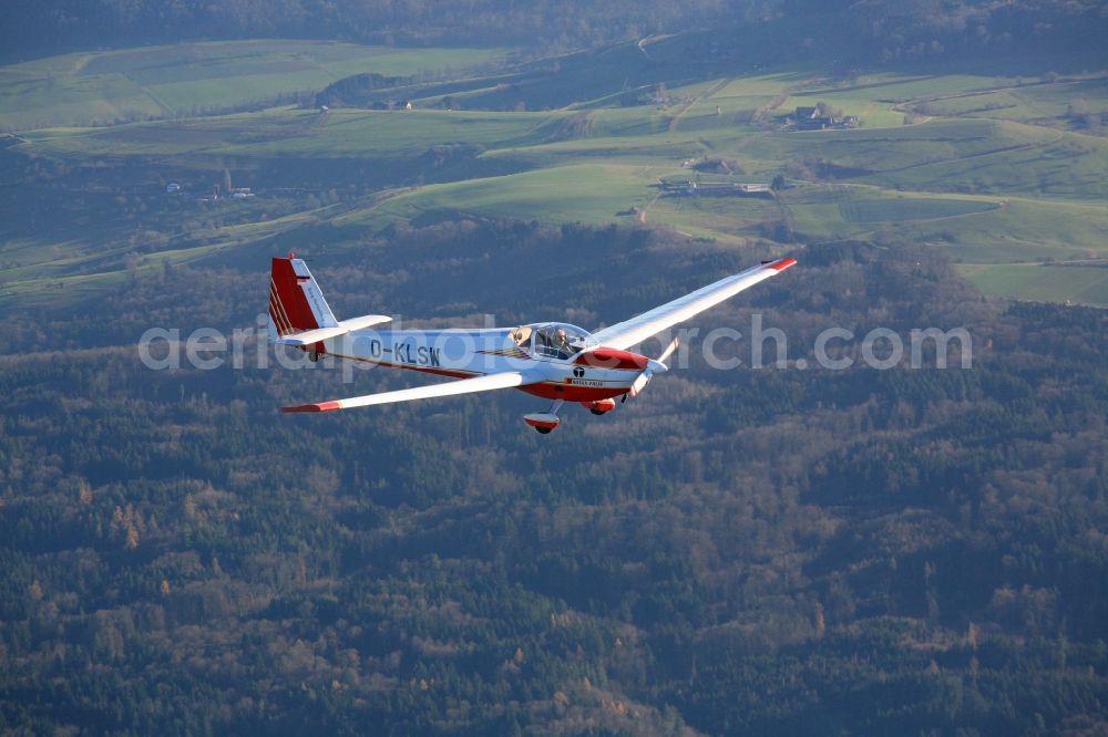 Rheinfelden (Baden) from the bird's eye view: Scheibe SF 25 CR Falke with callsign D-KLSW in flight in the airspace over Rheinfelden (Baden) in the state Baden-Wuerttemberg