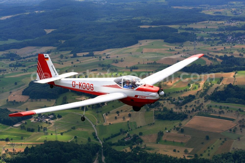 Aerial photograph Rheinfelden (Baden) - Scheibe SF 25 C Falke with callsign D-KOOG in flight in the airspace over Rheinfelden Adelhausen in the state Baden-Wuerttemberg