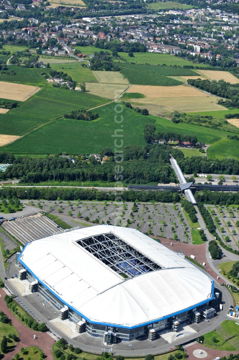 Gelsenkirchen from the bird's eye view: View the Veltins-Arena, the stadium of Bundesliga football team FC Schalke 04. The multifunctional arena also offers space for concerts and other sports events such as biathlon, ice hockey or boxing