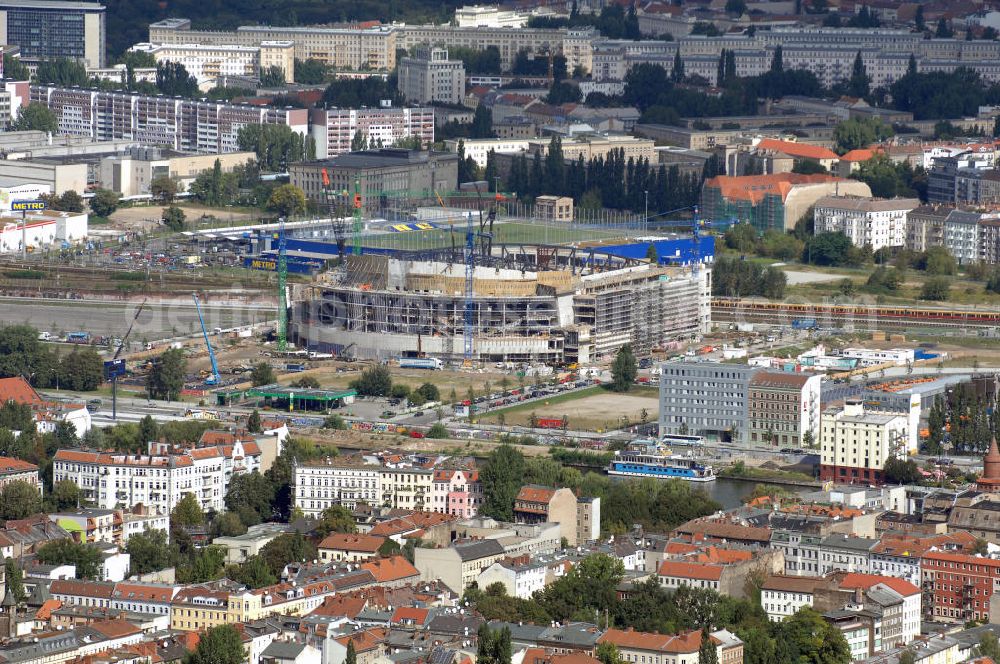 Aerial photograph Berlin - Blick auf die Multifunktionshalle O2 World auf dem Gelände am ehemaligen Postgüterbahnhof. Die Anschutz Entertainment Group und O2-Germany eröffnen 2008 Europas modernste Multifunktionshalle mit ca. 17.000 Plätzen. Bis Herbst 2008 entsteht am Ostbahnhof in Berlin Friedrichshain mit der neuen O 2 World ein Haus der Premieren und eine neue Heimat für Sport und Entertainment. Eigentümer: Anschutz Entertainment Group, Detlef Kornett, Geschäftsführer; Projektleitung: Kevin Murphy, Senior Vice President Development; Tel. +49 (30) 20 60 70 80,