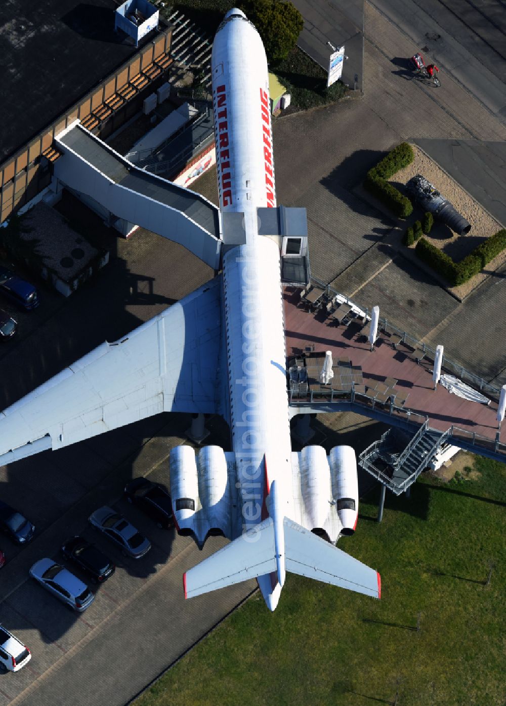 Leipzig from the bird's eye view: Discarded Ilyushin IL-62 passenger aircraft of the former GDR - airline INTERFLUG as an aircraft with the registration DDR-SEF - used as a museum building ensemble and restaurant on Arno-Nitzsche-Strasse in the southern part of the city Leipzig in the state of Saxony, Germany