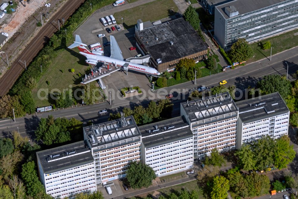 Leipzig from the bird's eye view: Discarded Ilyushin IL-62 passenger aircraft of the former GDR - airline INTERFLUG as an aircraft with the registration DDR-SEF - used as a museum building ensemble and restaurant on Arno-Nitzsche-Strasse in the southern part of the city Leipzig in the state of Saxony, Germany