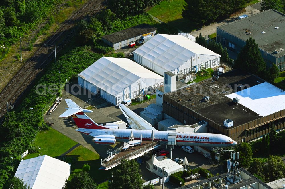 Leipzig from the bird's eye view: Discarded Ilyushin IL-62 passenger aircraft of the former GDR - airline INTERFLUG as an aircraft with the registration DDR-SEF - used as a museum building ensemble and restaurant on Arno-Nitzsche-Strasse in the southern part of the city Leipzig in the state of Saxony, Germany