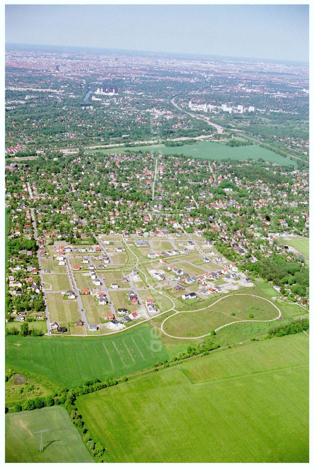 Aerial photograph Teltow / Brandenburg - Bau des Musikerviertels der Deutschen Post Immobilien an der Beethovenstraße in Teltow / Brandenburg. Herr Dipl.-Ing. Manfred von Sanden Deutsche Post AG, Charles-de-Gaulle-Straße 20, 53113 Bonn,Tel. 0228-182-4202