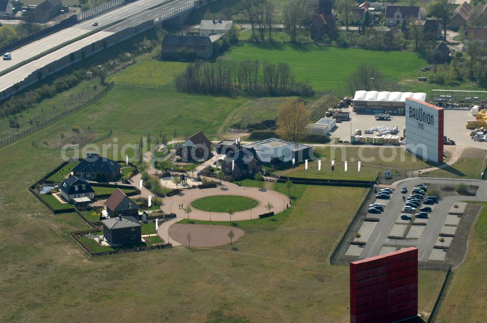 Grebs from the bird's eye view: Residential area model home park- single-family house- settlement on street Am Massivhauspark in Grebs in the state Brandenburg, Germany