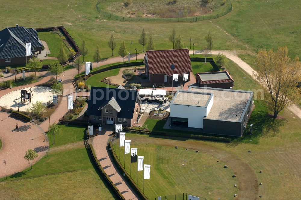 Aerial photograph Grebs - Residential area model home park- single-family house- settlement on street Am Massivhauspark in Grebs in the state Brandenburg, Germany