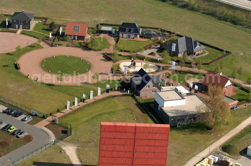 Grebs from the bird's eye view: Residential area model home park- single-family house- settlement on street Am Massivhauspark in Grebs in the state Brandenburg, Germany