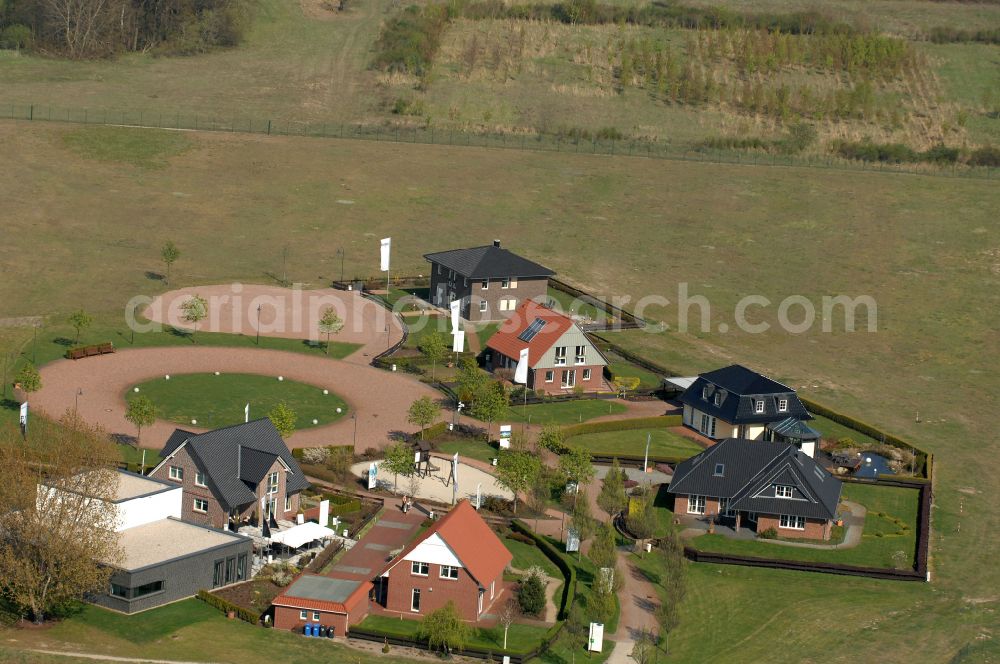 Aerial photograph Grebs - Residential area model home park- single-family house- settlement on street Am Massivhauspark in Grebs in the state Brandenburg, Germany