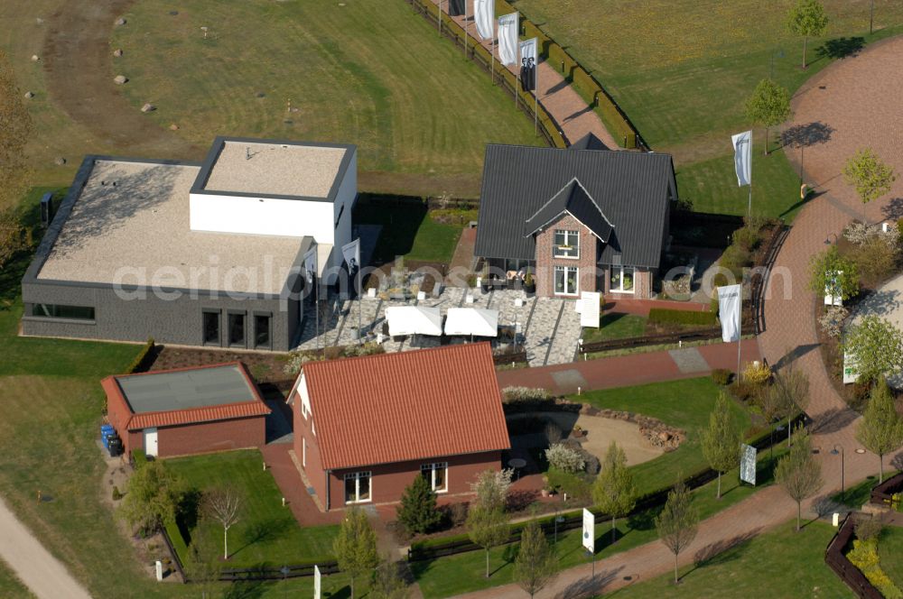 Grebs from the bird's eye view: Residential area model home park- single-family house- settlement on street Am Massivhauspark in Grebs in the state Brandenburg, Germany