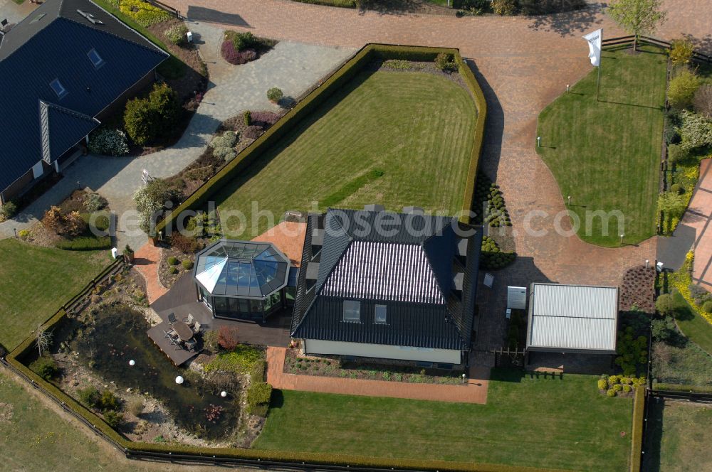 Aerial image Grebs - Residential area model home park- single-family house- settlement on street Am Massivhauspark in Grebs in the state Brandenburg, Germany