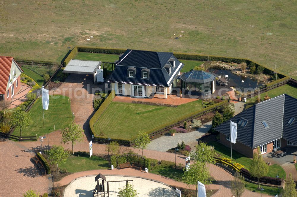 Grebs from the bird's eye view: Residential area model home park- single-family house- settlement on street Am Massivhauspark in Grebs in the state Brandenburg, Germany