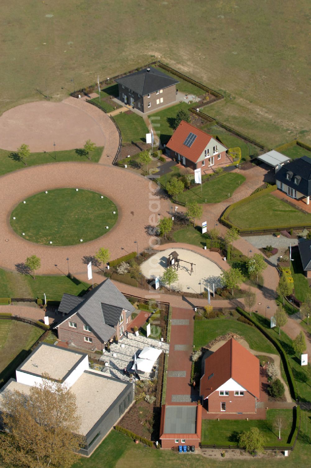 Grebs from the bird's eye view: Residential area model home park- single-family house- settlement on street Am Massivhauspark in Grebs in the state Brandenburg, Germany