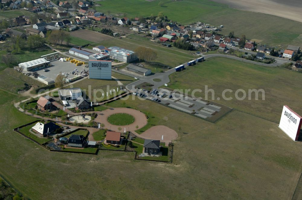 Aerial photograph Grebs - Residential area model home park- single-family house- settlement on street Am Massivhauspark in Grebs in the state Brandenburg, Germany