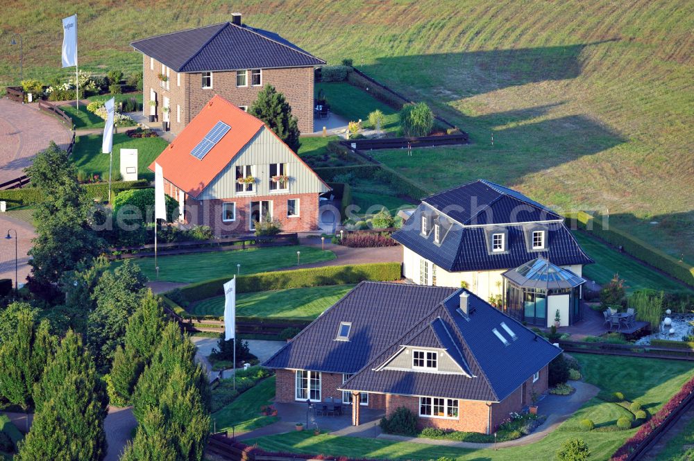 Grebs from the bird's eye view: Residential area model home park- single-family house- settlement on street Am Massivhauspark in Grebs in the state Brandenburg, Germany