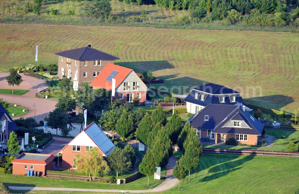 Grebs from the bird's eye view: Residential area model home park- single-family house- settlement on street Am Massivhauspark in Grebs in the state Brandenburg, Germany