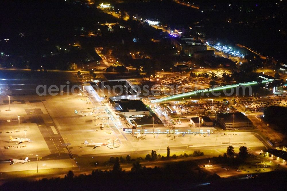 Schönefeld from the bird's eye view: Night view dispatch building and terminals on the premises of the airport Schoenefeld in Schoenefeld in the state Brandenburg