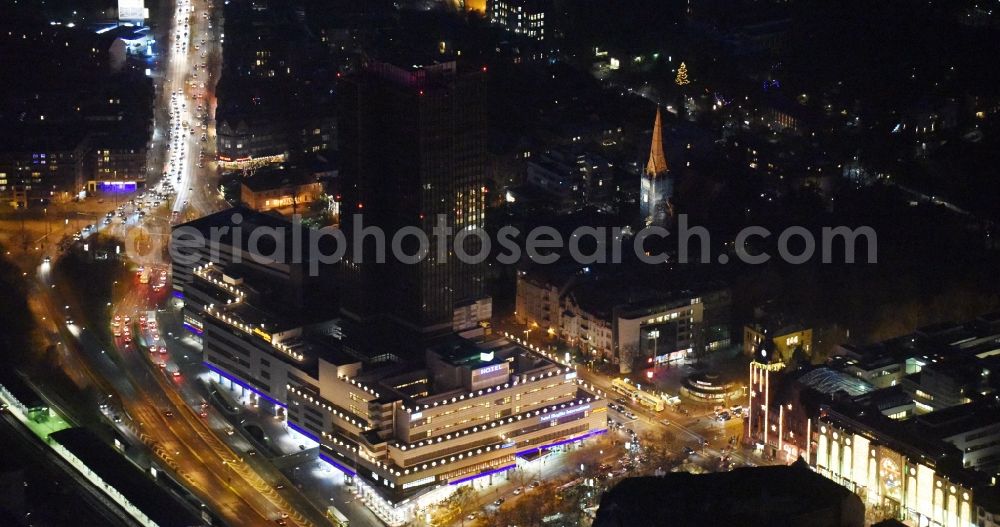 Aerial image Berlin - Night view of the Steglitzer Kreisel, a empty building complex with an office tower in Berlins district of Steglitz