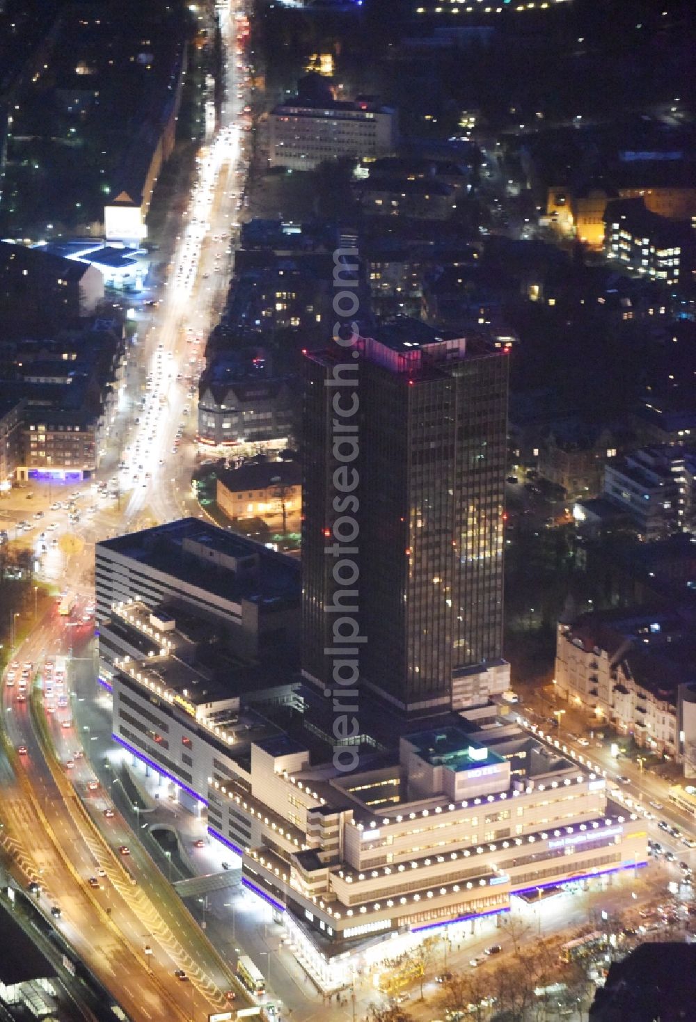 Aerial photograph Berlin - Night view of the Steglitzer Kreisel, a empty building complex with an office tower in Berlins district of Steglitz