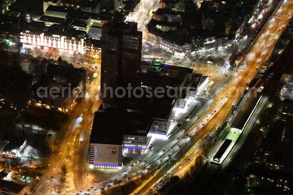 Aerial photograph Berlin - Night view of the Steglitzer Kreisel, a empty building complex with an office tower in Berlins district of Steglitz